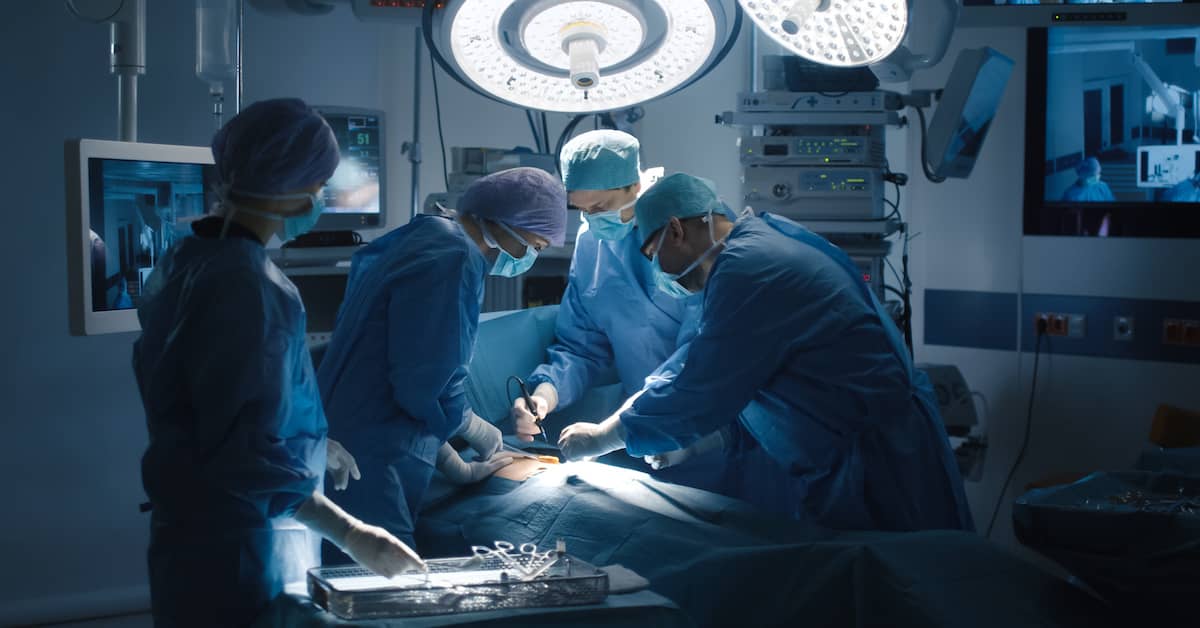 surgeons perform an opertation | Coplan and Crane